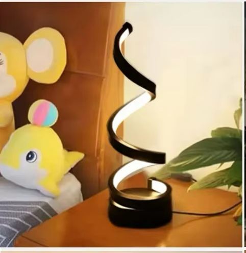 מנורת שולחן מסולסלת בעיצוב מודרני